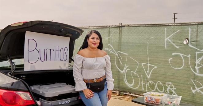 LOS ANGELES -- JUNE 27, 2025: Maria Sanchez AKA @mariadelosburritos selling burritos in Watts on Friday, June 27, 2025. (Yasara Gunawardena / For The Times)