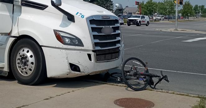 A cyclist was injured Friday, Aug. 8, 2025, after being hit by a transport truck on Fallowfield Road (Photo courtesy: Scott McLay)