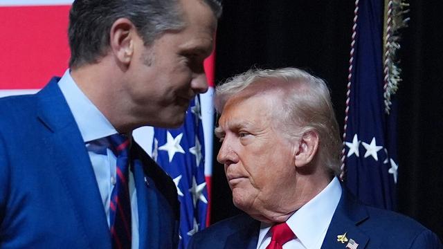 President Donald Trump is greeted by Secretary of Defense Pete Hegseth before speaking to a gathering of top U.S. military commanders at Marine Corps Base Quantico, Tuesday, Sept. 30, 2025, in Quantico, Va. (AP Photo/Evan Vucci) President Donald Trump is greeted by Secretary of Defense Pete Hegseth before speaking to a gathering of top U.S. military commanders at Marine Corps Base Quantico, Tuesday, Sept. 30, 2025, in Quantico, Va. (AP Photo/Evan Vucci)