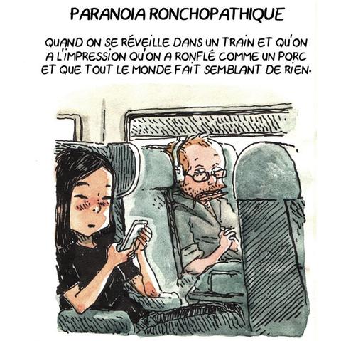 PARANOÏA RONCHOPATHIQUE
Quand on se réveille dans un train et qu'on a l'impression qu'on a ronflé comme un porc et que tout le monde fait semblant de rien.

(On voit Boulet se réveiller sur son siège, pâteux, à côté d'une jeune femme qui n'a l'air intéressée que par son téléphone et ne prête absolument aucune attention à ses voisins)