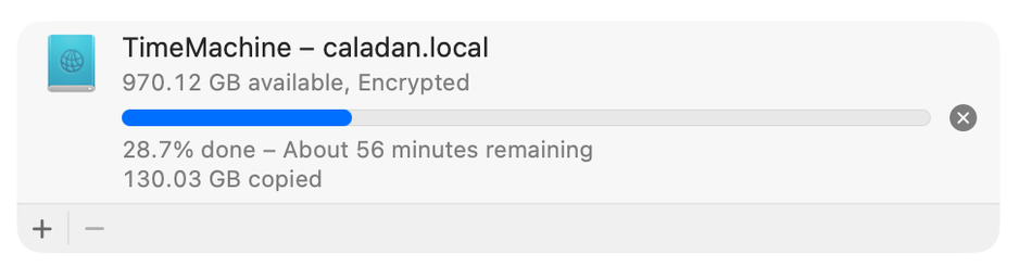 Screenshot of a Time Machine backup running. Backing up to caladan.local.