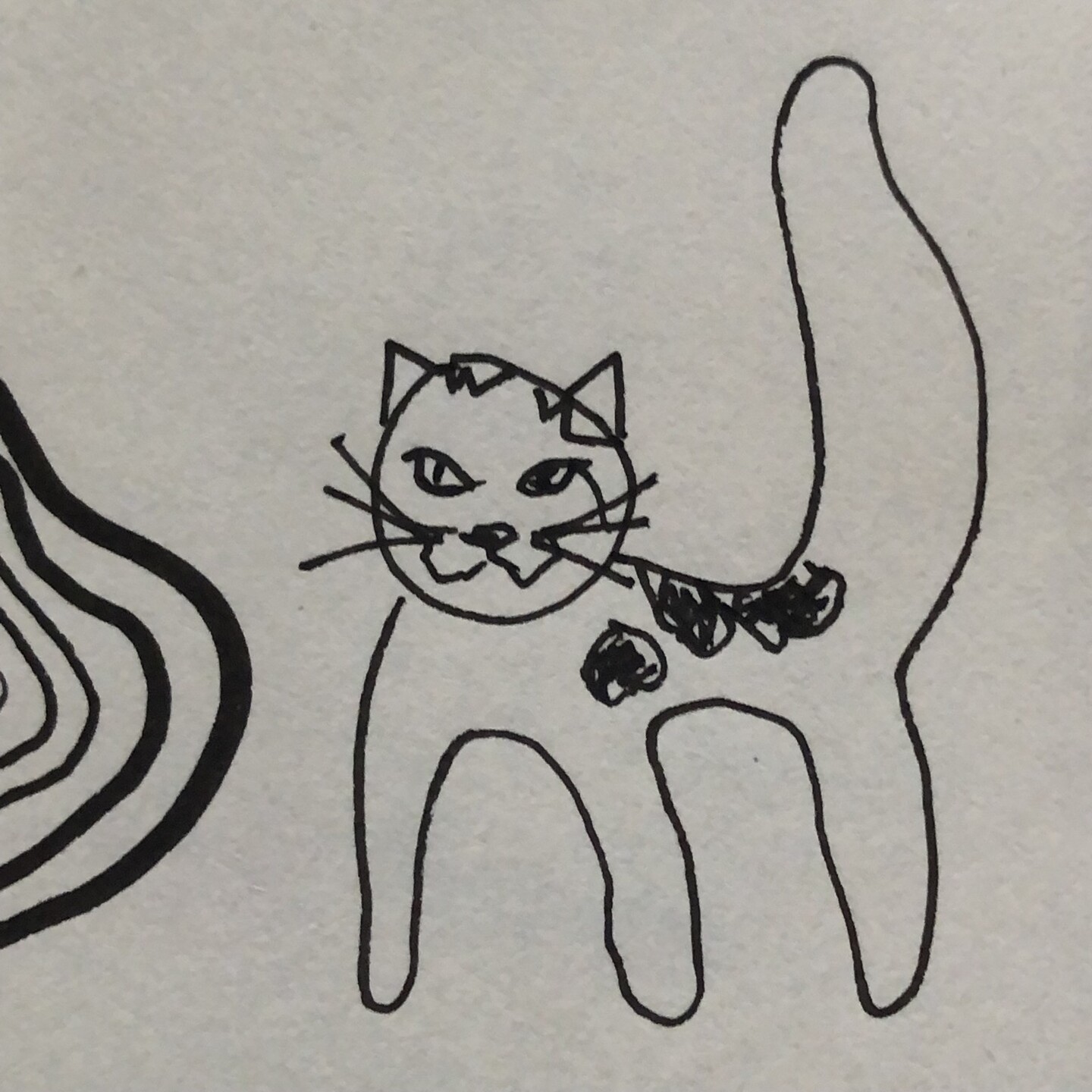 A poorly drawn cat with a mean grin and three legs.