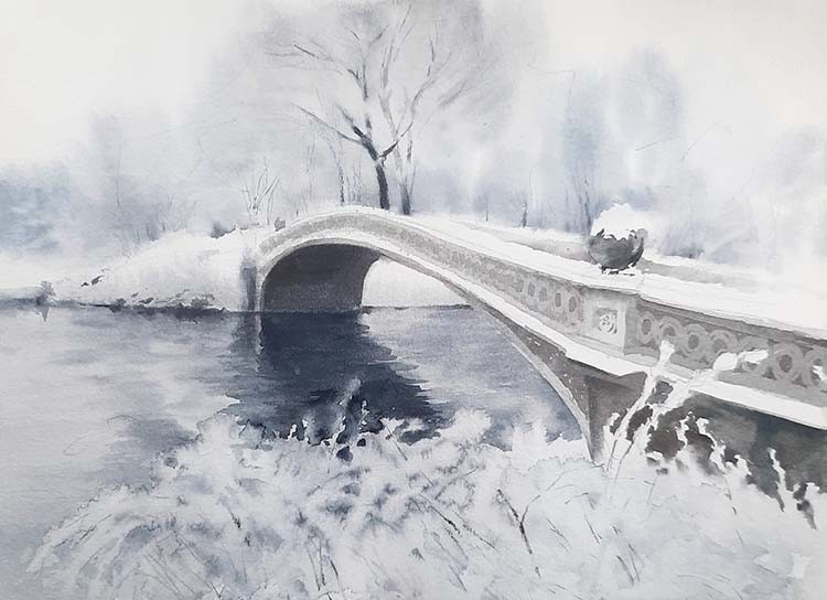 Winter morning on the river bank. The bridge and coastal plants are covered with snow and hoarfrost. The thick morning fog blends the silhouettes of the trees on the opposite bank.