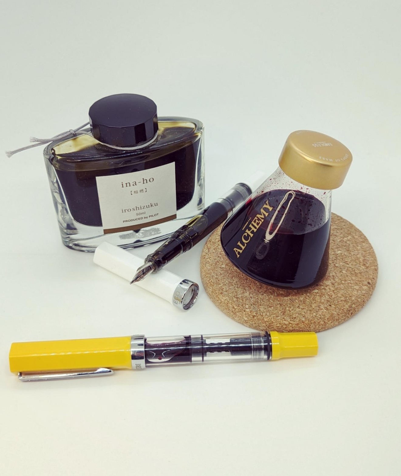 Fountain pens and ink bottles