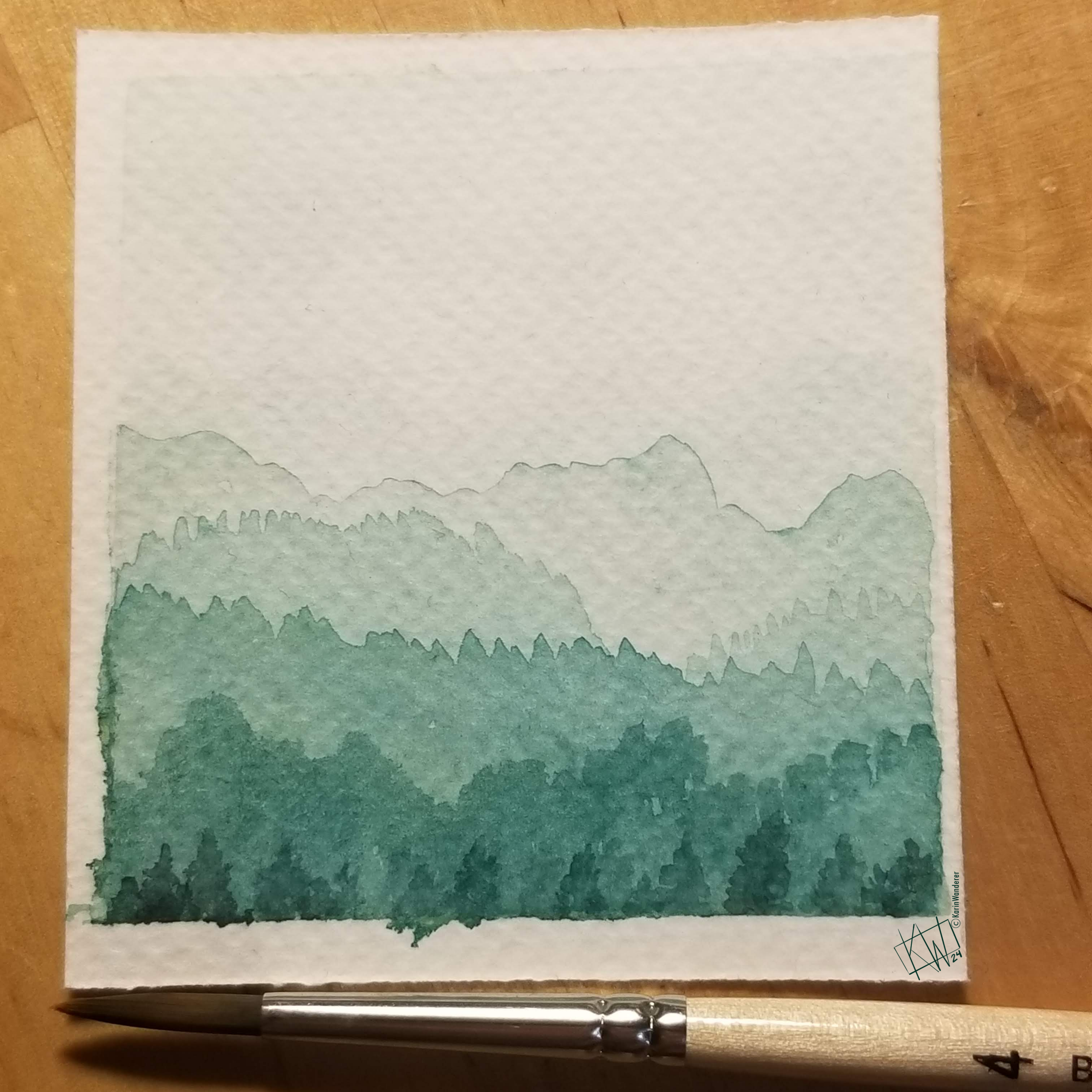 Watercolor landscape in shades of green: pine trees stand in front of forested mountains stretching back into the foggy distance.