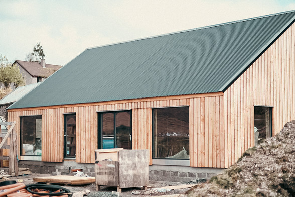 A colour photo of our house build in Annat, on the shores of Upper Loch Torridon. Torridon, Wester Ross, Scottish Highlands.

Photo by and copyright of Paul Henni. 