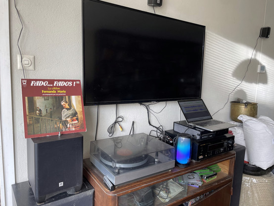 Home entertainment setup with record player and a vinyl record, 