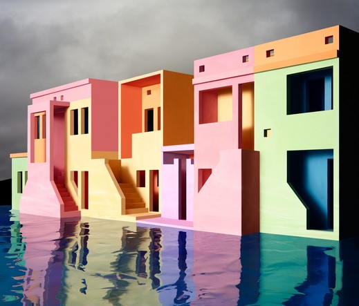 water rises around candy-colored architectural models