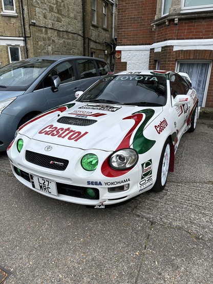 Toyota Celica rally car with exactly the same sponsor branding as the car in Sega Rally