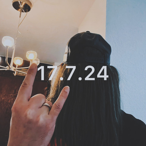 You see a Date: 17.7.24; myself with long hair;