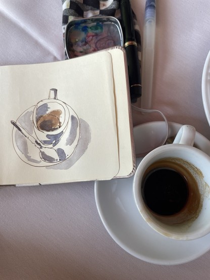 Photo of the same sketch with reference coffee 