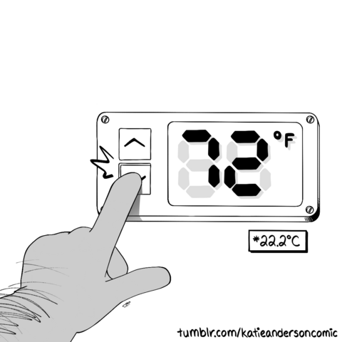 In frame is the thermostat and his hand as he presses the 