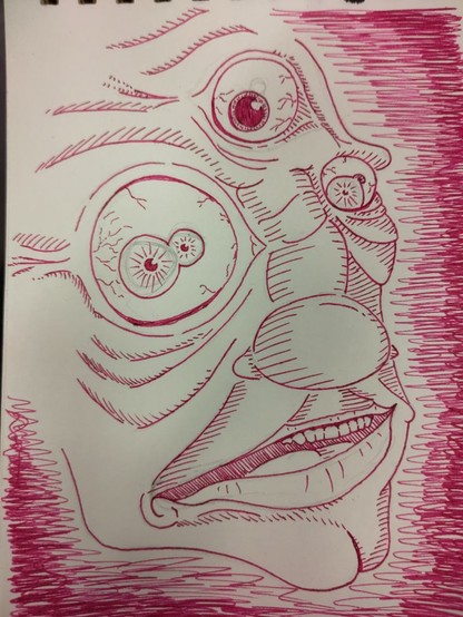 A distorted face with three eyes and 5 pupils altogether, in red ink, looking at you in a shocked or agitated way from the side