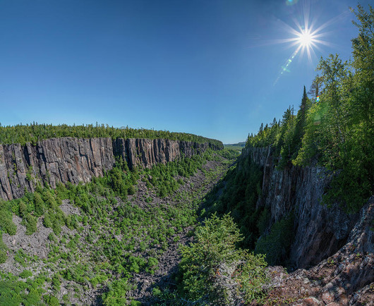 The sun shines over Ouimet Canyon north of Lake Superior in Ontario. 