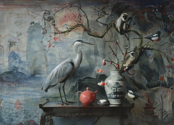 a heron stands on a tabletop next to a pink ceramic teapot. a monkey and bird perch on branches emerging from a vase with japanese architecture painted on the side