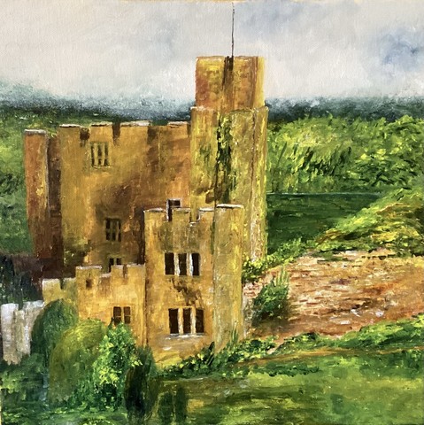 Fortified manor house with keep, tower and battlements in yellow stone set in wood and parkland