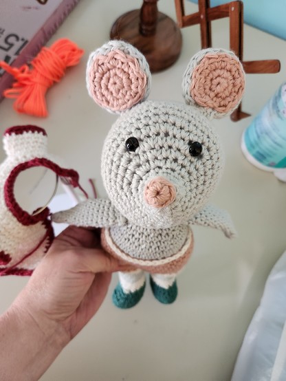 Amigurumi mouse crochet in light grey.I just finished the shorts and little jacket now I need to put a mouth on it.