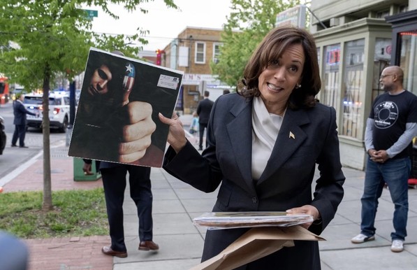 Meme of Kamala Harris holding up an album cover. I picked Don McLean‘s album American Pie. On the cover, he’s giving a thumbs up, and the thumb is painted like an American flag.

(Rather ironic though, because the song is pretty religious, and Don McLean is questionable politically.)
