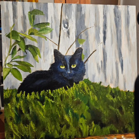 a work in progress oil painting on panel of a black cat in front of a weathered fence, framed with lots of shrubs and big leafy plants. 