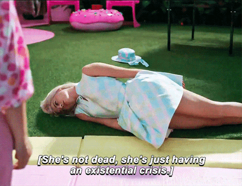 Screen from Barbie with barbie lying stiff on the ground and the caption that says 