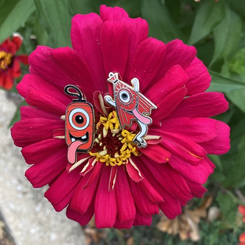 chochin obake and kasa obake pins on a red flower 