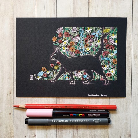 Original drawing - Black Cat
A drawing of a black cat with a background of flowers.  
I used colour pencil and other media on acid free black paper to create this drawing.  