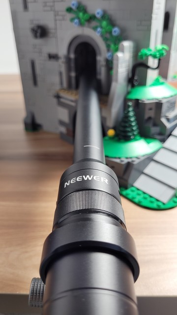 The Neewer LS-51 probe lens for phones with the barrel inside a LEGO door 