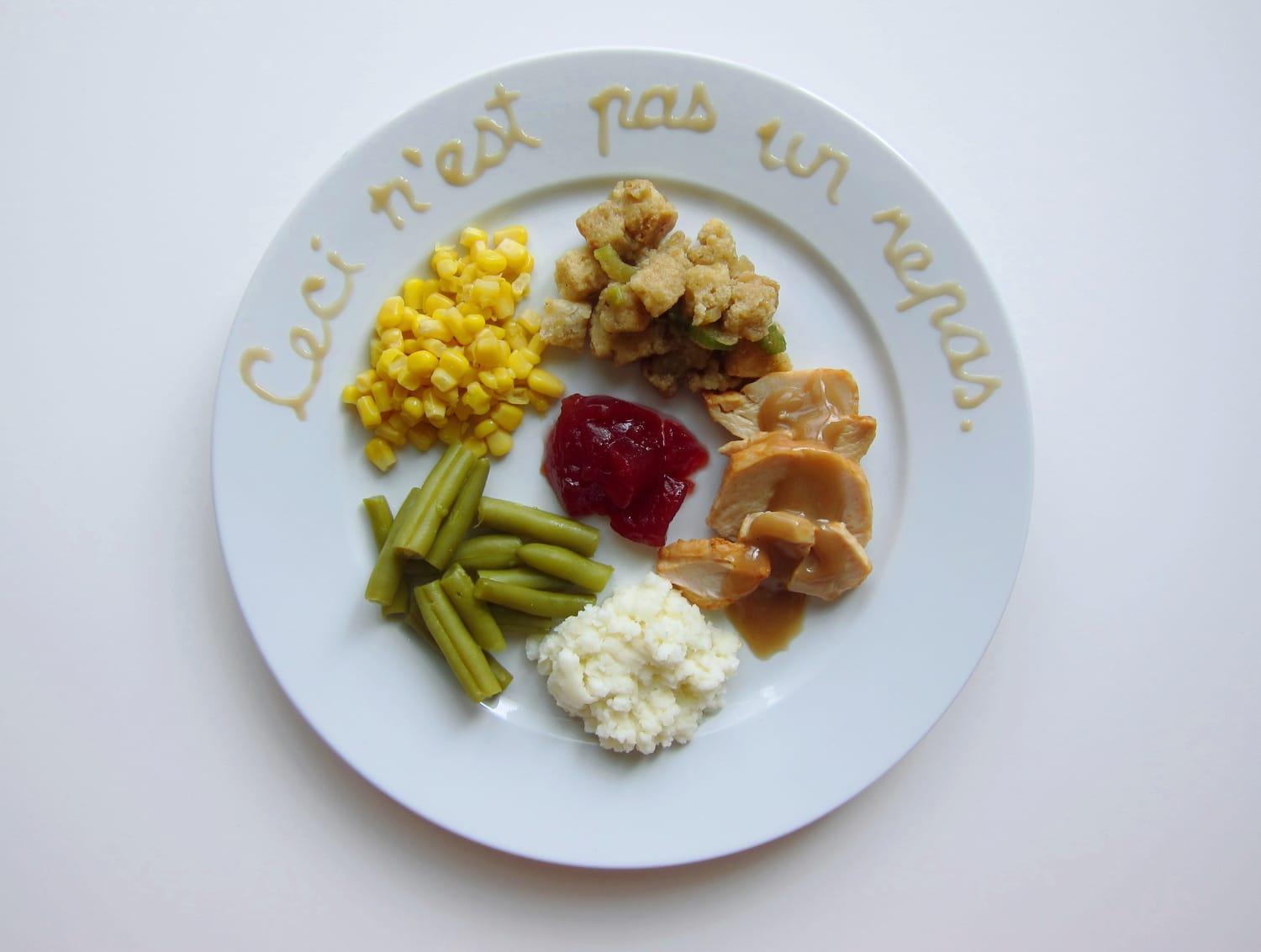 thanksgiving dinner plated in the style of René Magritte