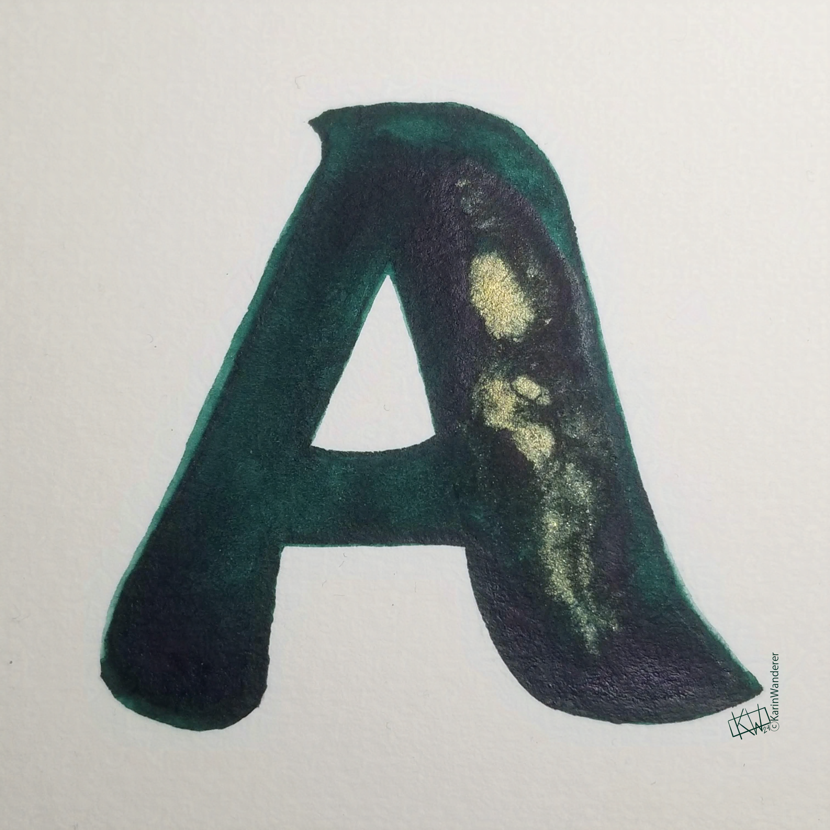 Watercolor of upper case letter A in a lovely shade of green with gold swirls.