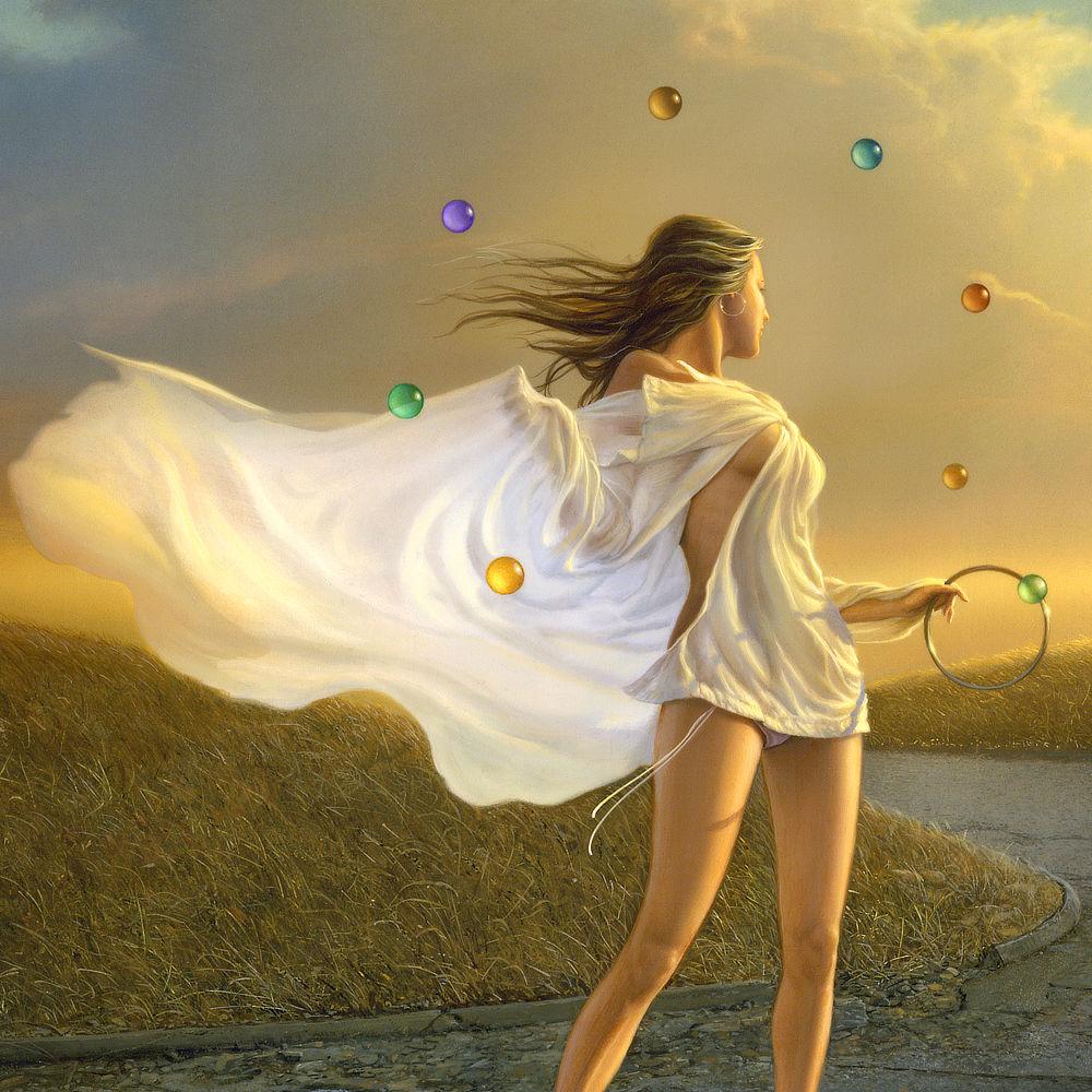 Close detail from ISLAND featuring a woman levitating above a parking lot of cracked asphalt. A circle of colorful glass orbs forms a loose circle around her. In her left hand she holds a metal ring that seems to have captured a green glass orb.
