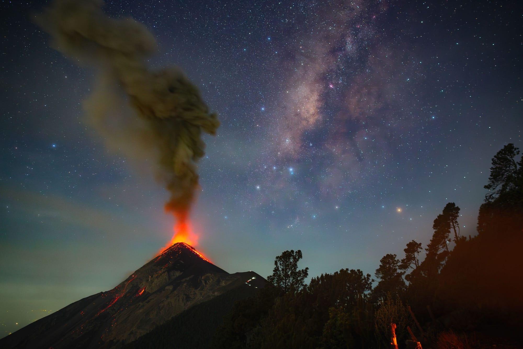 a volcano erupts beneath the milky way a volcano erupts beneath the milky way
