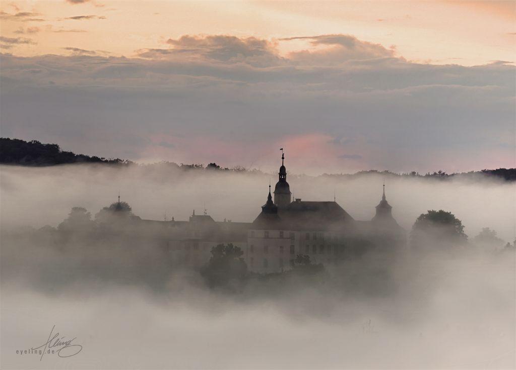 Photo shot last Friday evening after a rainy day. Dense fog was rising from the river valley to envelope a local castle overlooking it. The architecture and trees surrounding it are about to be swallowed by nothingness, only two towers and the middle part beibg clearly visible. Photo shot last Friday evening after a rainy day. Dense fog was rising from the river valley to envelope a local castle overlooking it. The architecture and trees surrounding it are about to be swallowed by nothingness, only two towers and the middle part beibg clearly visible.
