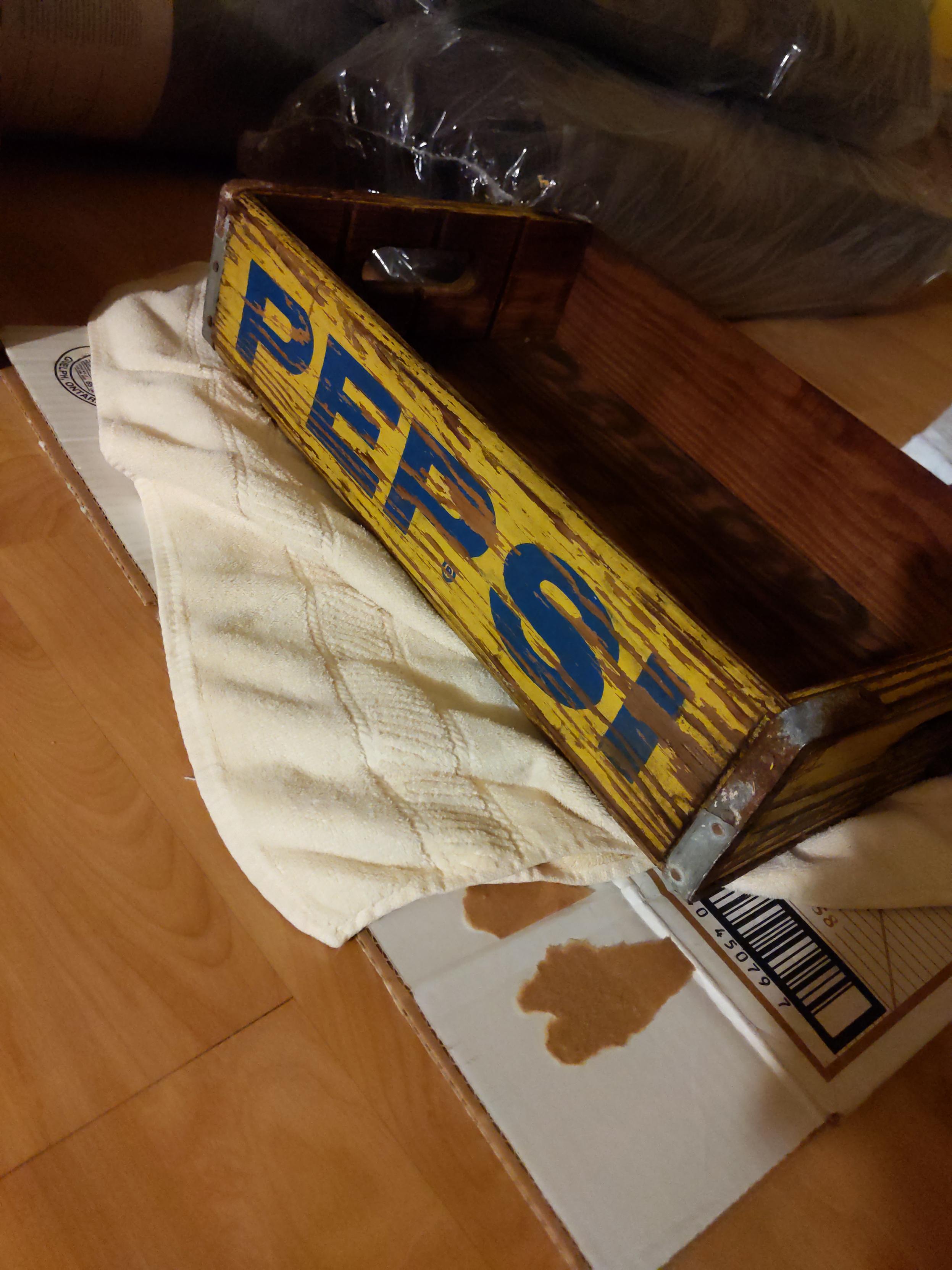 A wooden case which held glass soft drink bottles, likely decades before I waa born.