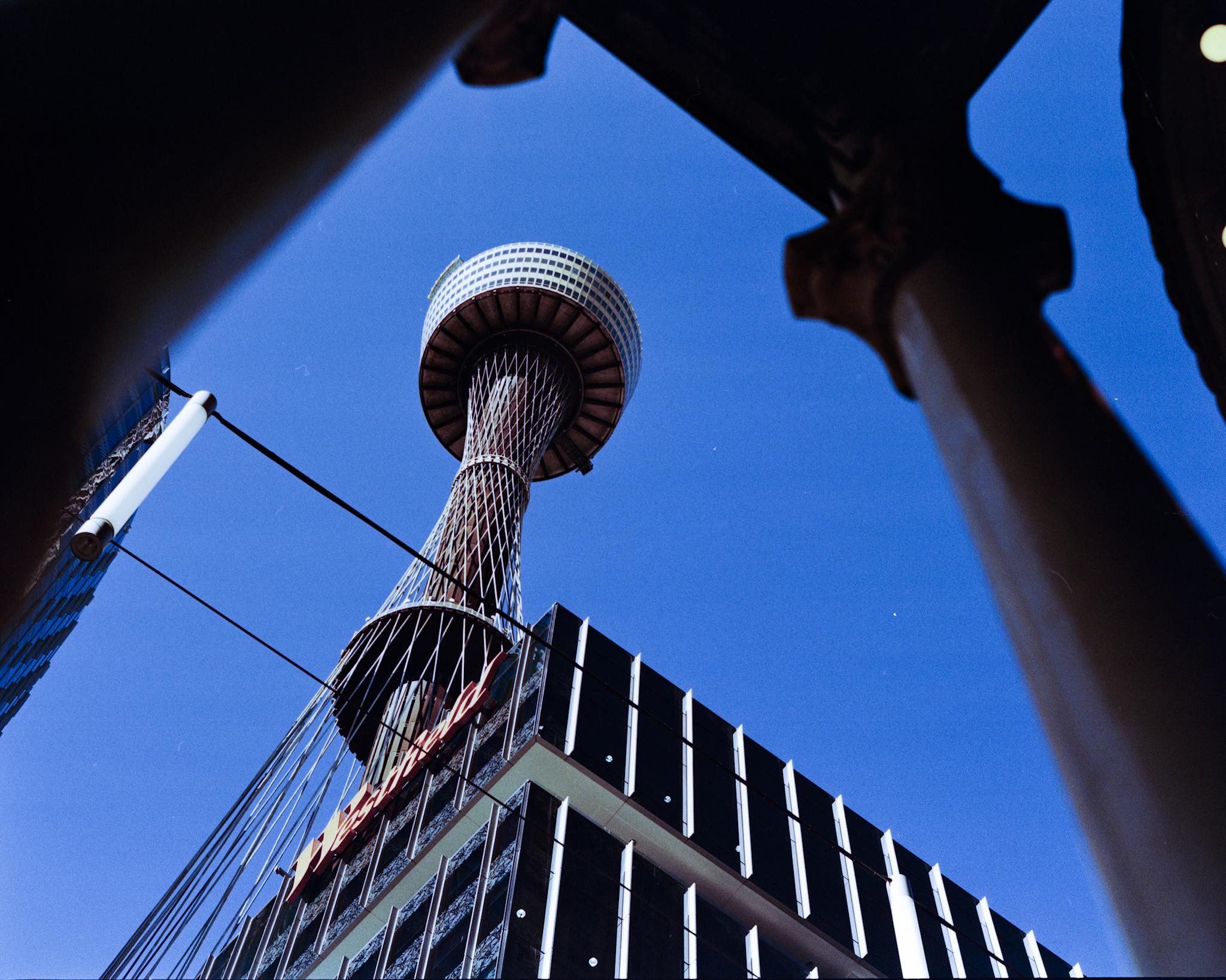 Film photo of Centre Point Tower in Sydney shot on Kodak Gold 200 with a Pentax 6x7 camera and a 105/2.4 lens for the @photozinecoll.bsky.social Vivid Zine, that I culled from my submissions. It didn’t make the cut. 