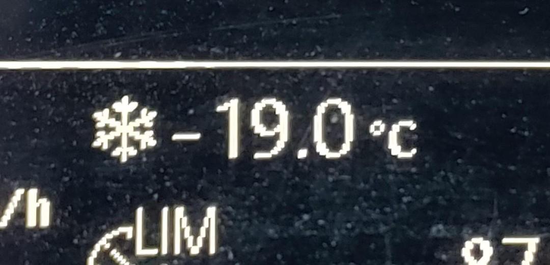 photo of car's thermostat showing cozy -19°C on a dusty dashboard 