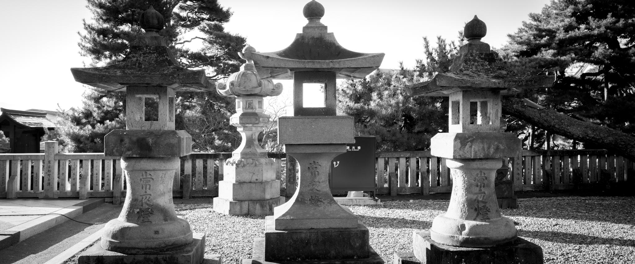 Black and white photo of temple lanterns at the Zenkoji shrine in Nagano.