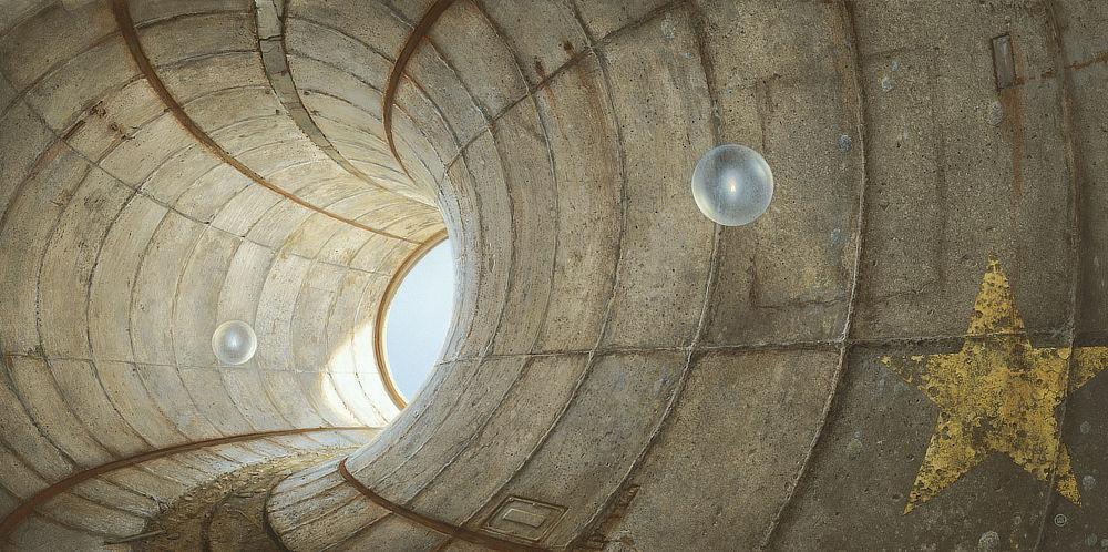 Two transparent spheres, each containing a single white flame, float through an arcing concrete passage. The curved walls are structured in rough rectangular panels. Strips of rusted metal trim run parallel to a path of dirt cut into the stone floor and lead around a bend and out to open air. On the wall closest (lower right panel) is a weathered 5-pointed star painted in yellow.