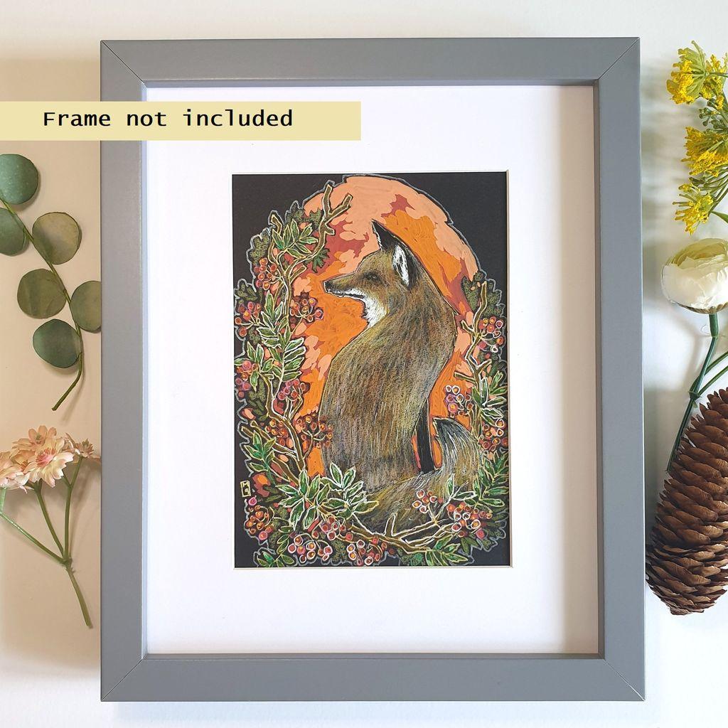 A small drawing in colour of a red fox with rowan leaves and berries in a design round the animal. The drawing is on black paper.
An original art work, please note that the frame is not included.
Colour pencil and mixed media on acid free toned artist paper
5 by 7 inches (12.7 by 17.8 cm).