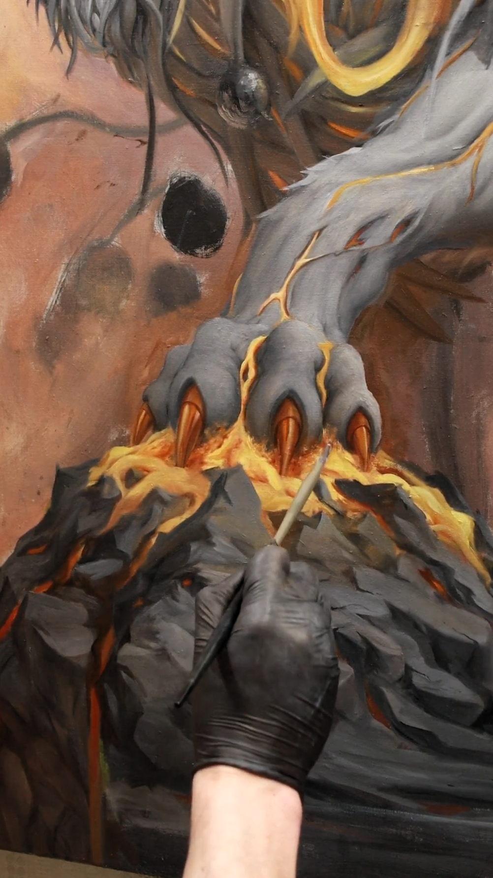 Video Thumbnail of the  process of painting a fantasy lion's paw with oil paints. The paw rests on a rock that is melting at the top and turning into lava.