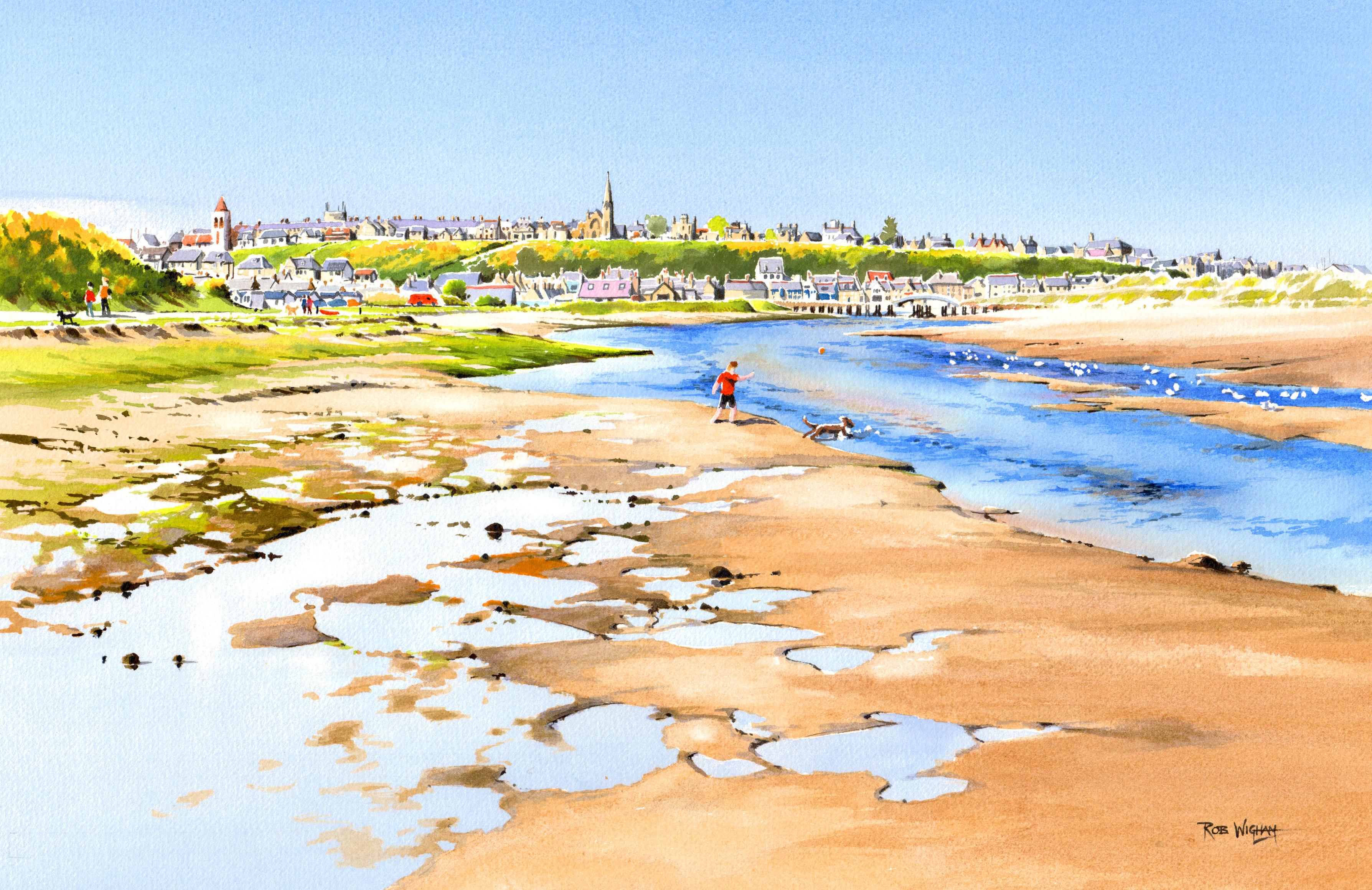 A view along a tidal river (Lossie in northern Scotland) at low tide. The river runs behind a beach and the dunes are visible at right beyond the river. A line of houses lines the hilltop looking down on the beach and some caravans are just visible at left. The orange colour on the hills comes from the gorse. The river shines blue and at bottom left the pools of water in the sand and mud reflect the sky. This is a popular dog walk, so people walk and play with their dogs throughout.