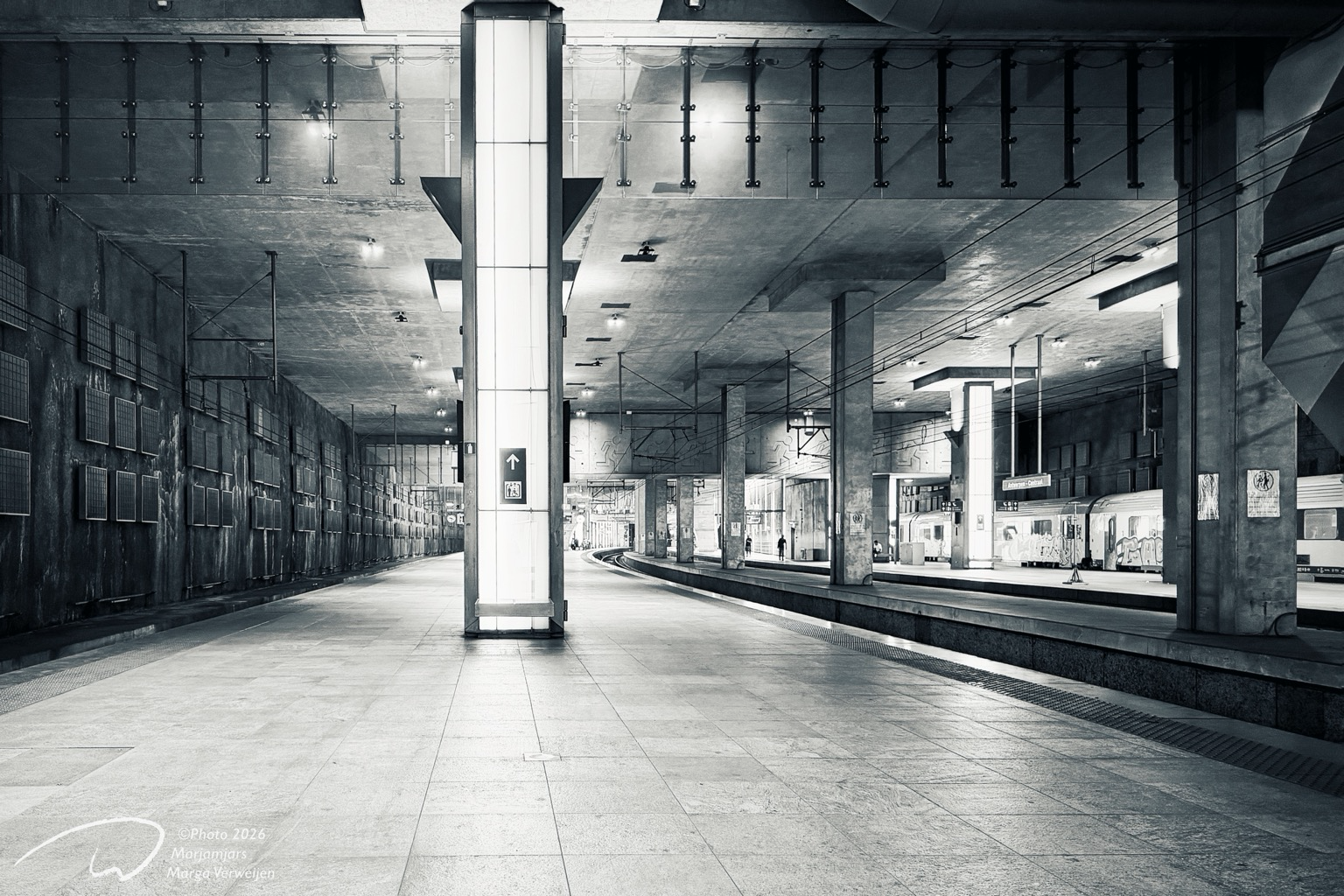 Empty underground train station’s platform at night.