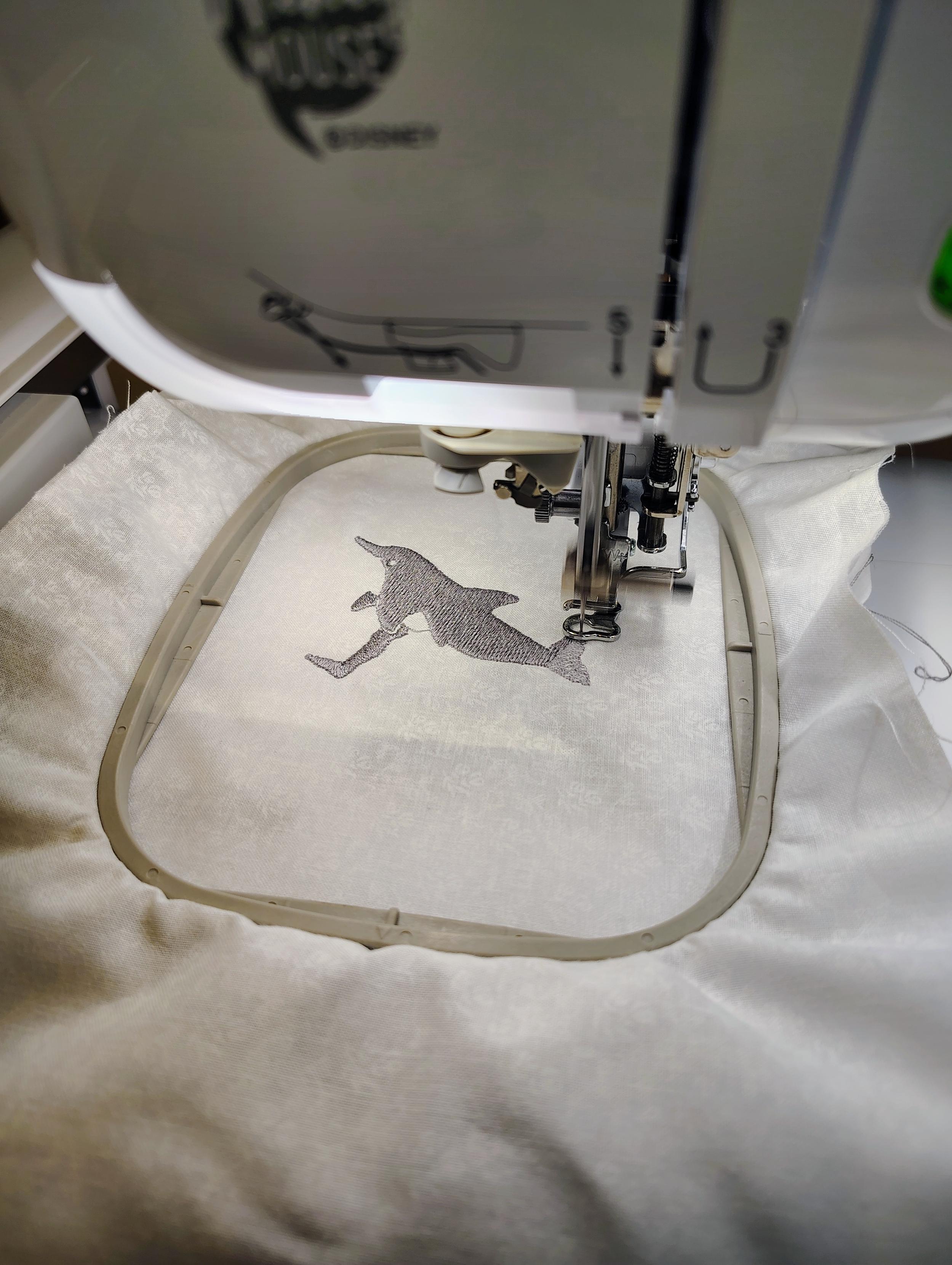 A close up of the hoop and needle in action.
