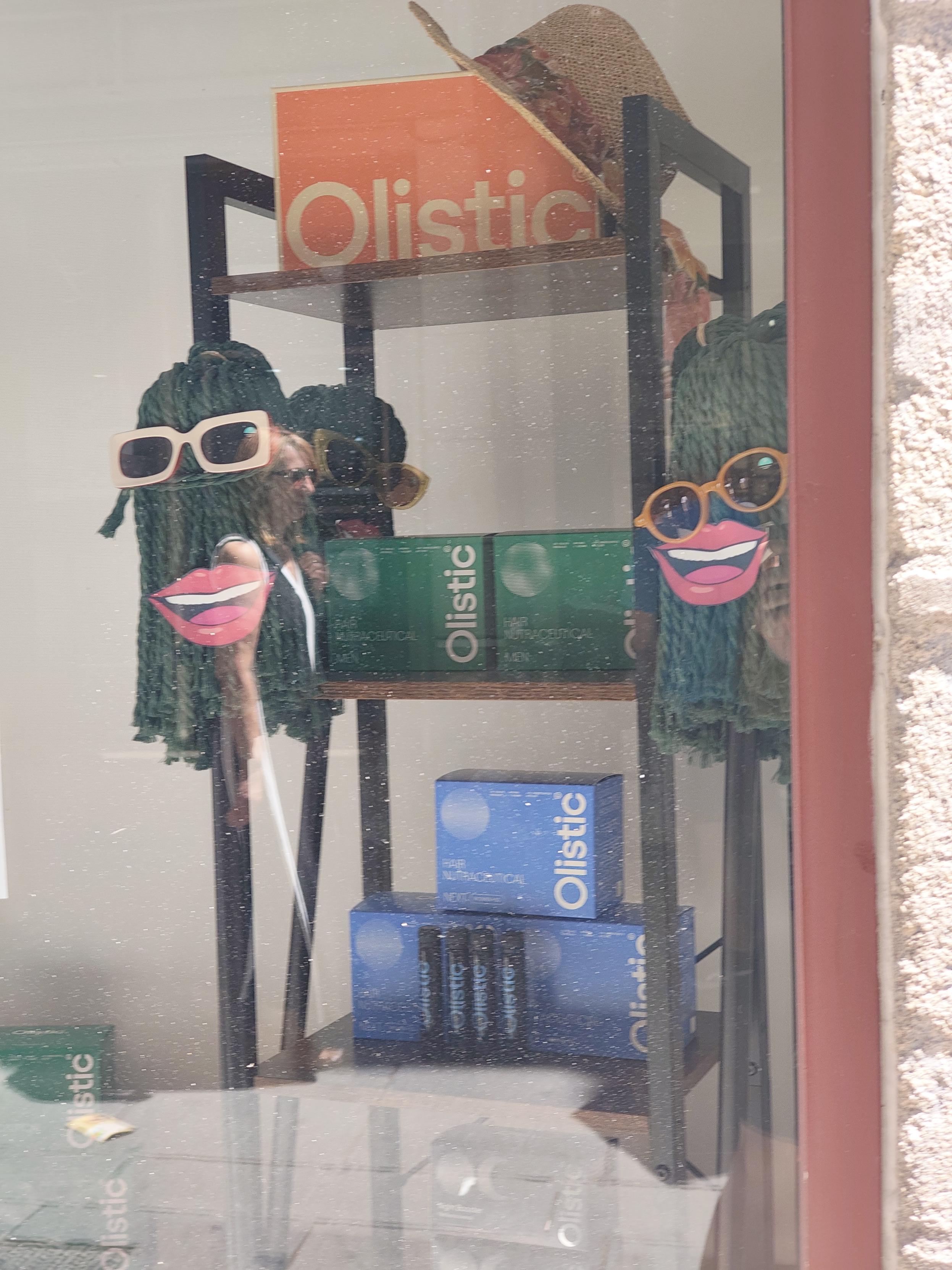Two mops with red Lipstick and sunglasses