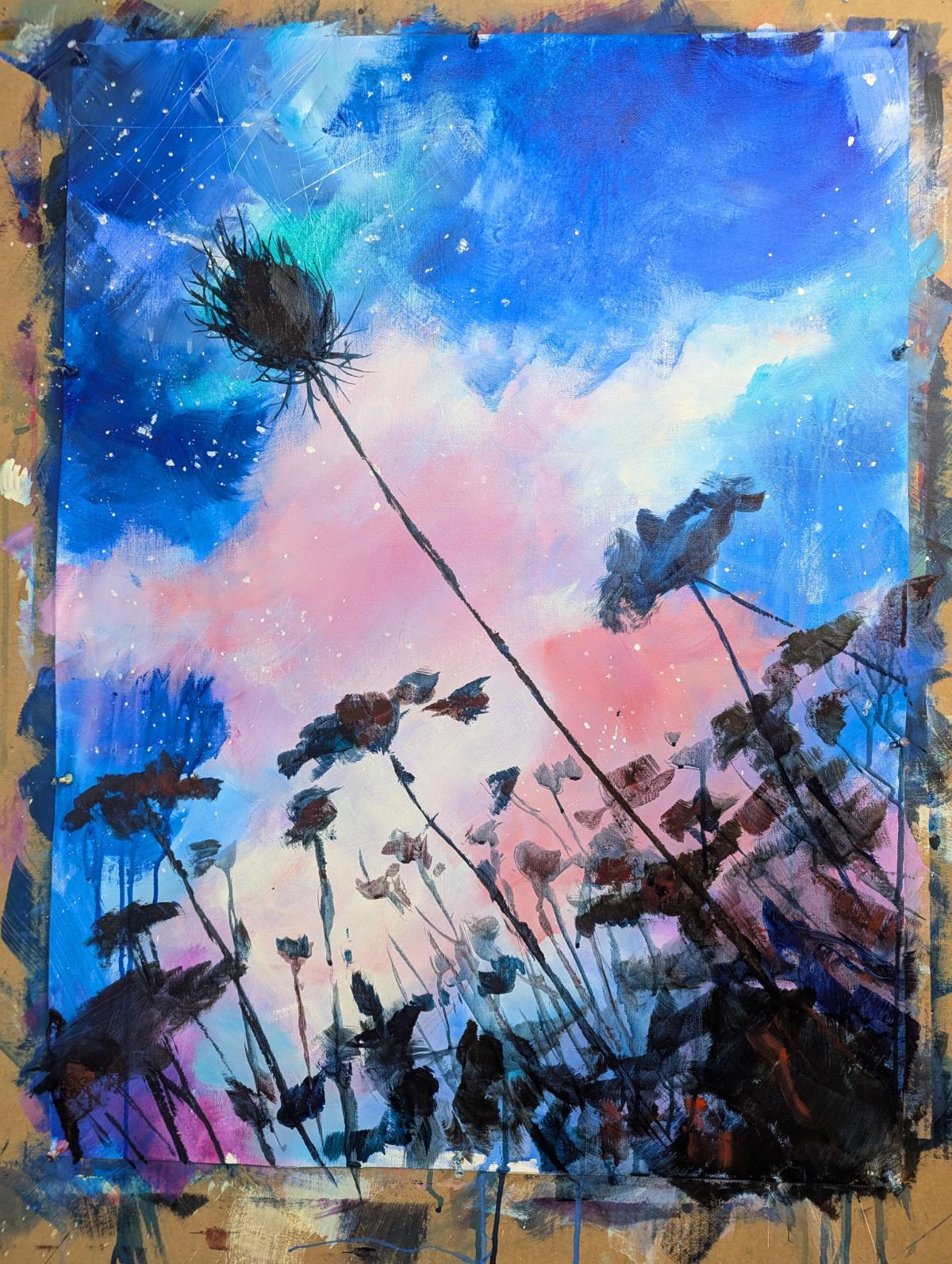 The background in pastel pinks and blues has gotten some stars, and there's a silhouette of wild carrot flowers in front of it. It's still very sketchy.