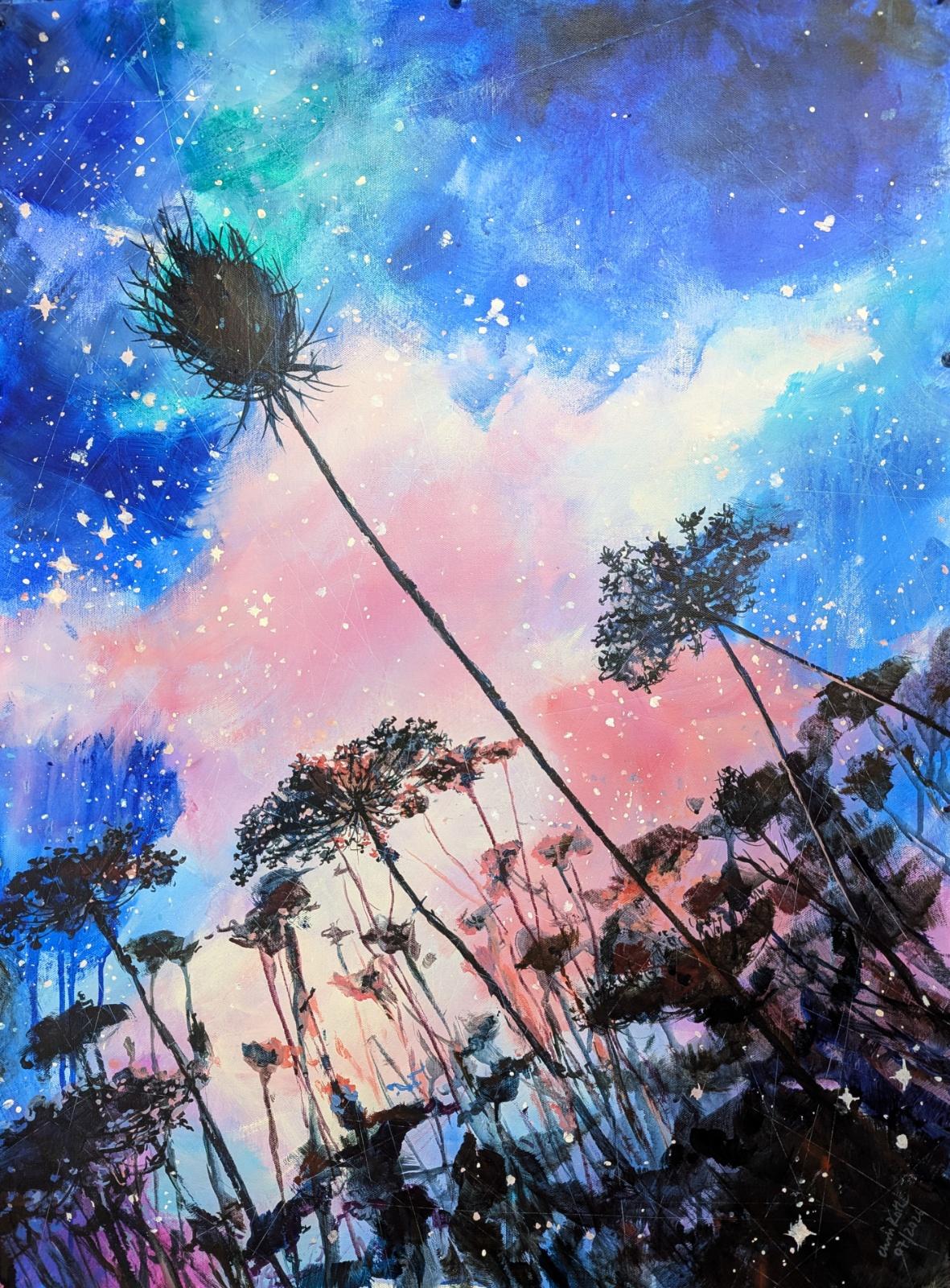Dark silhouettes of carrot flowers stretching to the blue and pale yellow and pastel pink sky which is full of stars.