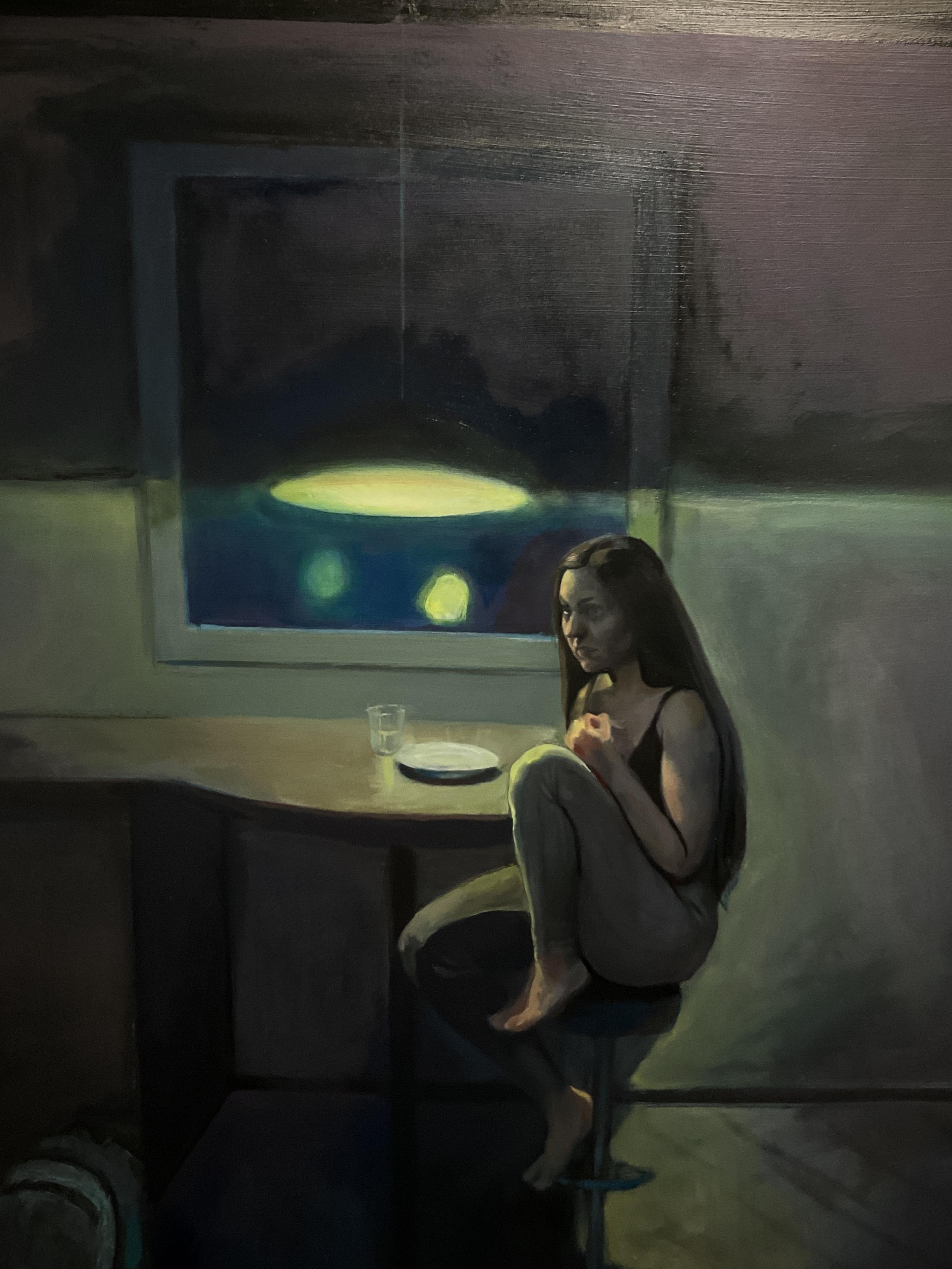 A sketchy layer of oil paint depicting half-squatting, curled up woman sitting on a stool next to a table and a dark window, with a bright yellow lamp right next to her face.