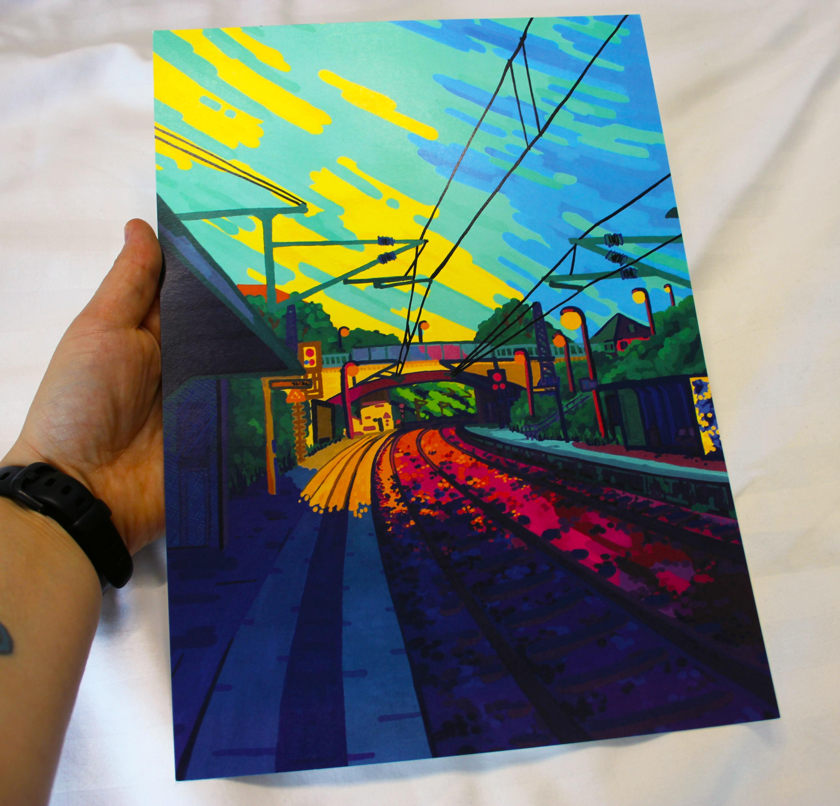 A photo of me holding the print