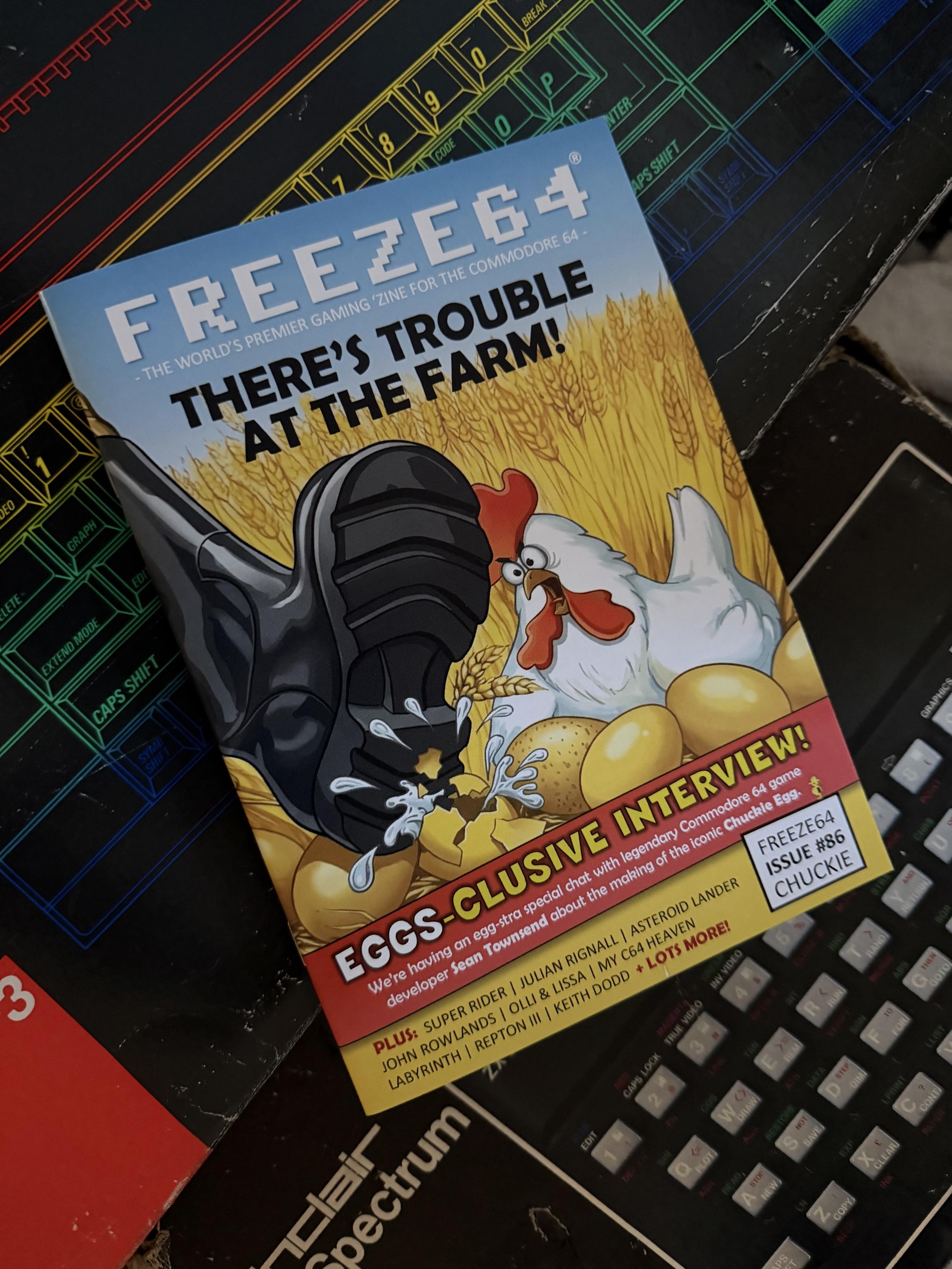 Magazine cover with a cartoon chicken and a boot. "Freeze64" title, "There's Trouble at the Farm!" subtitle.
