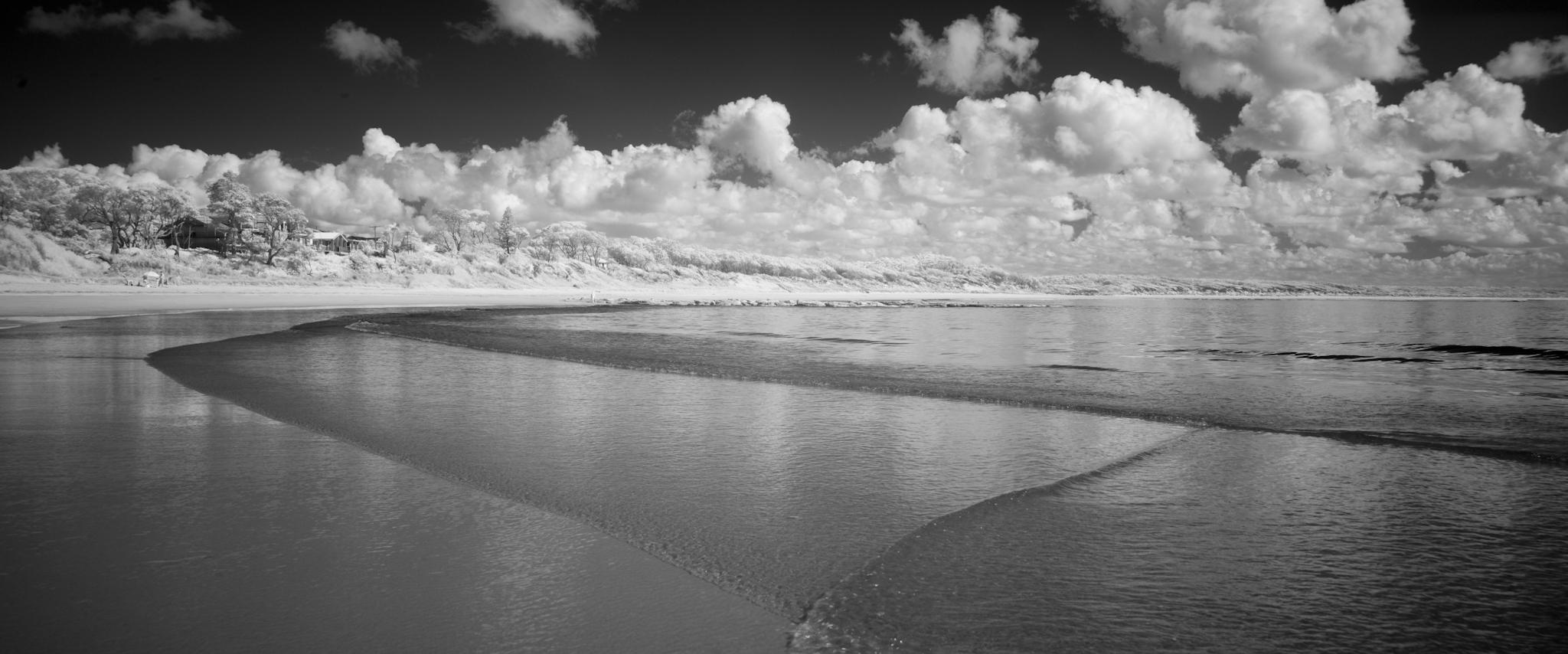 Black and white infrared anamorphic photo of the beach at Currarong.