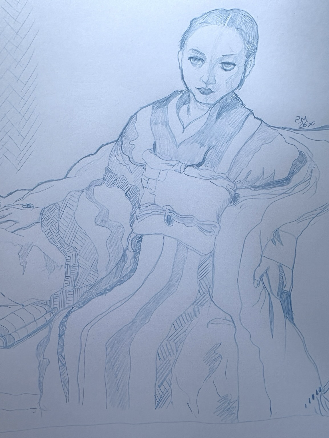 Woman in kimono portrait challenge showing a woman reclining on a couch